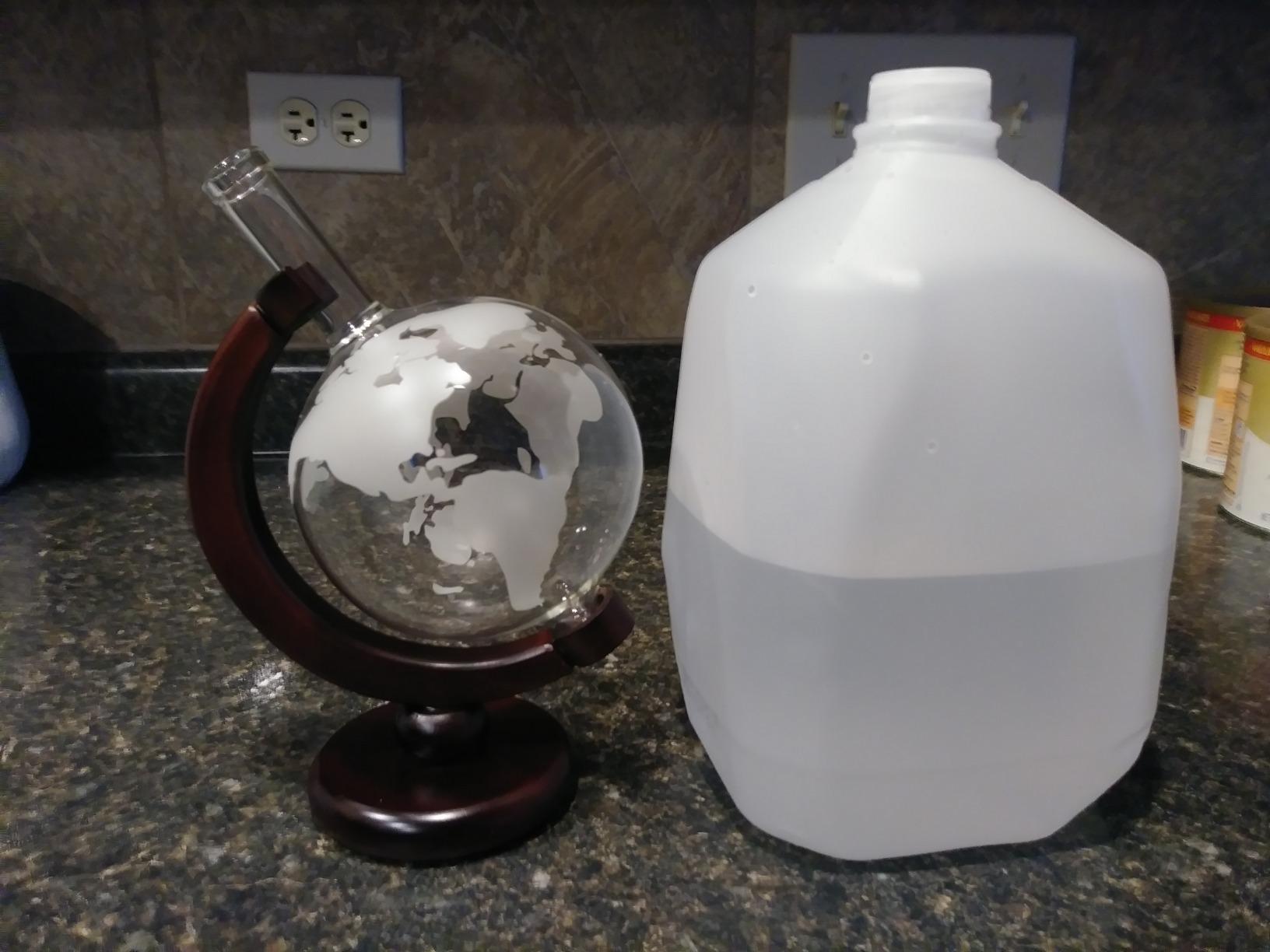 Lily's Home World Globe Whiskey Decanter with Dark Finished Wood Stand and Bar Funnel, Let Your Favorite Vintages Breathe with this Beautifully Stylish and Functional Piece (850 ml) customer photo 2