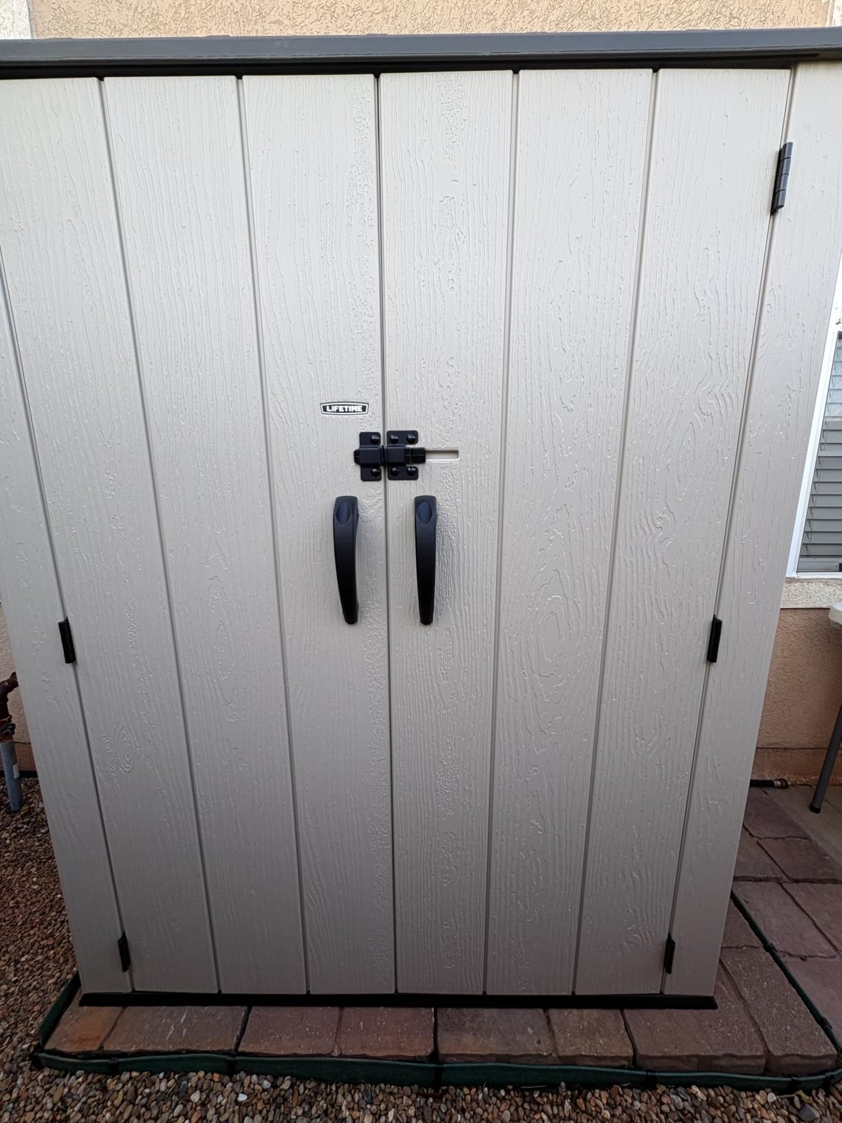 Lifetime Vertical Storage Shed, Desert Sand, Resin Outdoor Tool Shed with Lockable Doors and Weather-Resistant Panels customer photo 1