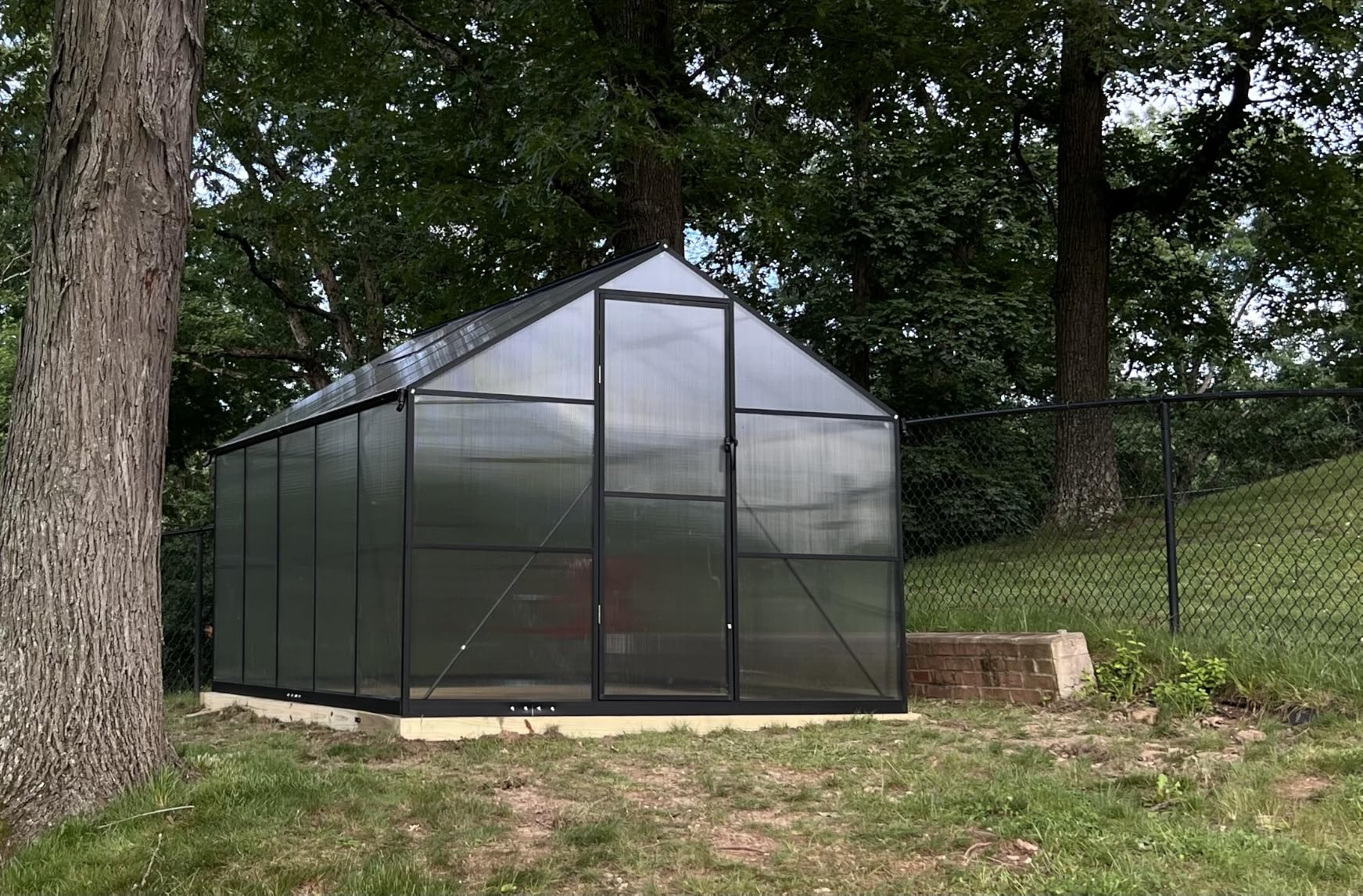 Jocisland 6x12Ft Polycarbonate Greenhouses for Outdoors, 2 Top-Opening Windows, Swing Doors, Aluminum Walk-in Heavy Duty for Outdoor Use, Backyard Garden, Black customer photo 1