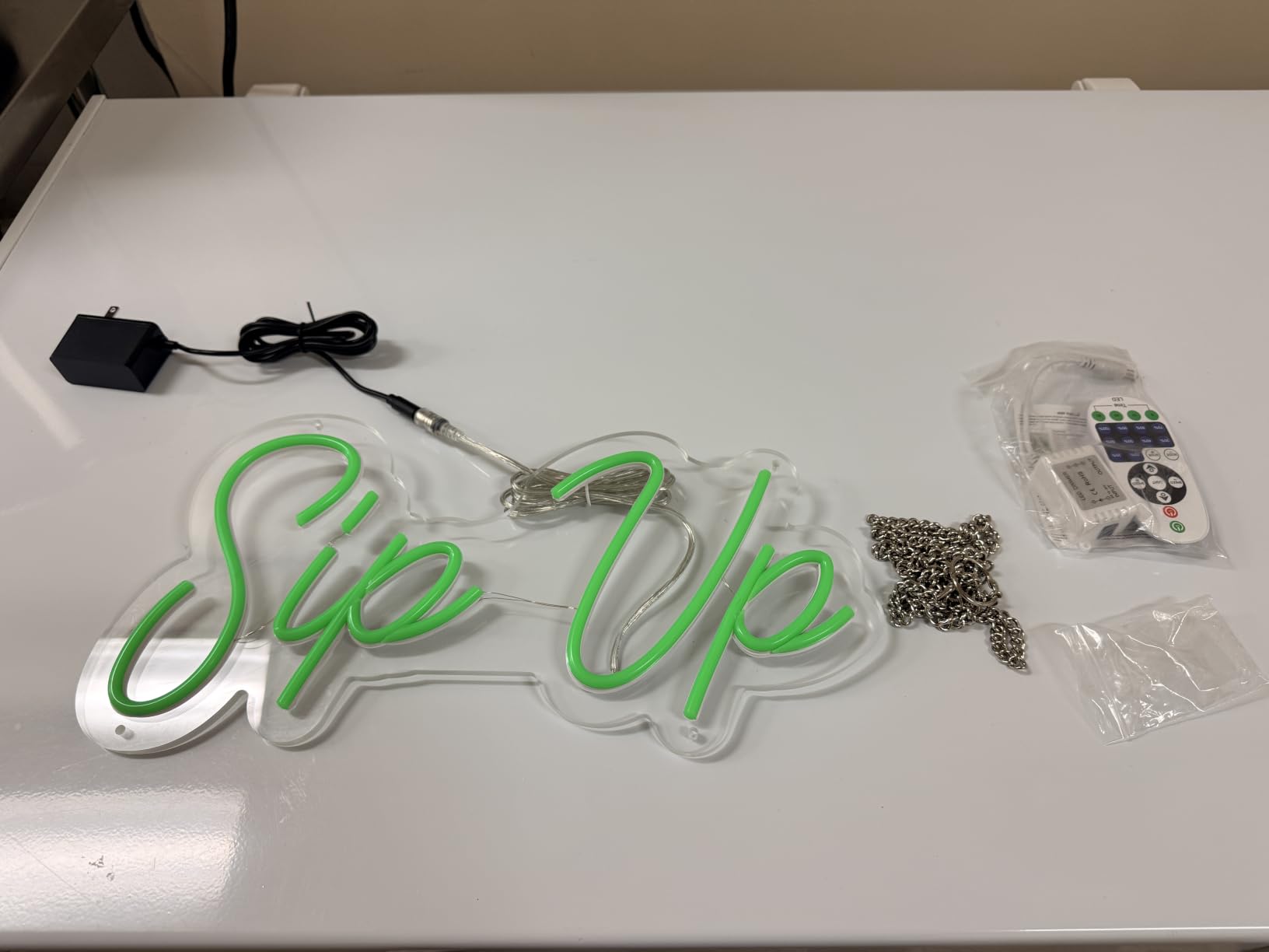 Custom Logo Neon Sign, UV Printed LED Sign for Business, Office & Salon | Personalize your logo or image with UV printing for storefronts, offices, salons, studios, clubs, bands, parties and events. customer photo 1