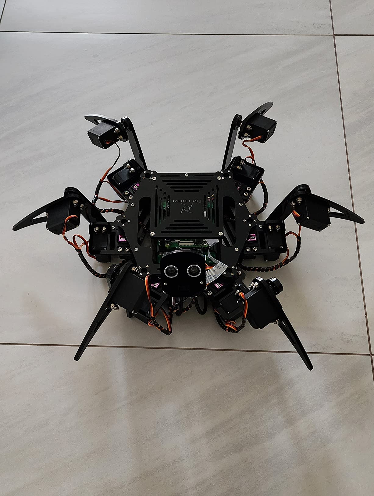 Freenove Big Hexapod Robot Kit for Raspberry Pi 5 4 B 3 B+ Zero 2 W, Walking, Self Balancing, Face Recognition, Ultrasonic Ranging, App Control, Camera, Servo (Raspberry Pi NOT Included) customer photo 1