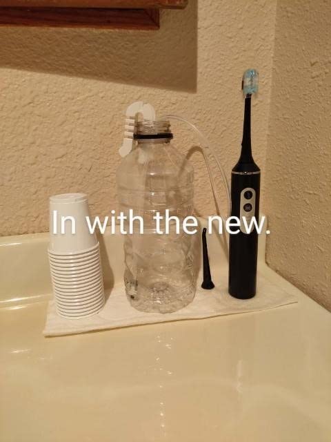 Electric Toothbrush with Water flosser, 2 in 1 Teeth Cleaning Kit, Toothbrush and Water flosser Combo, Travel Toothbrush with Water Bottle(White) customer photo 1
