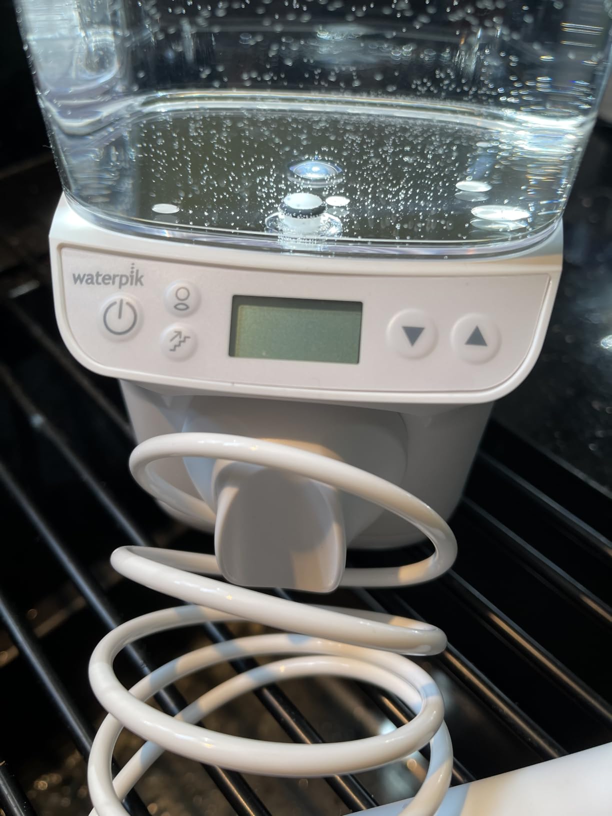 Waterpik Promax Countertop Water Flosser, SmartAdvance, 10 Settings, 5 Tips customer photo 1