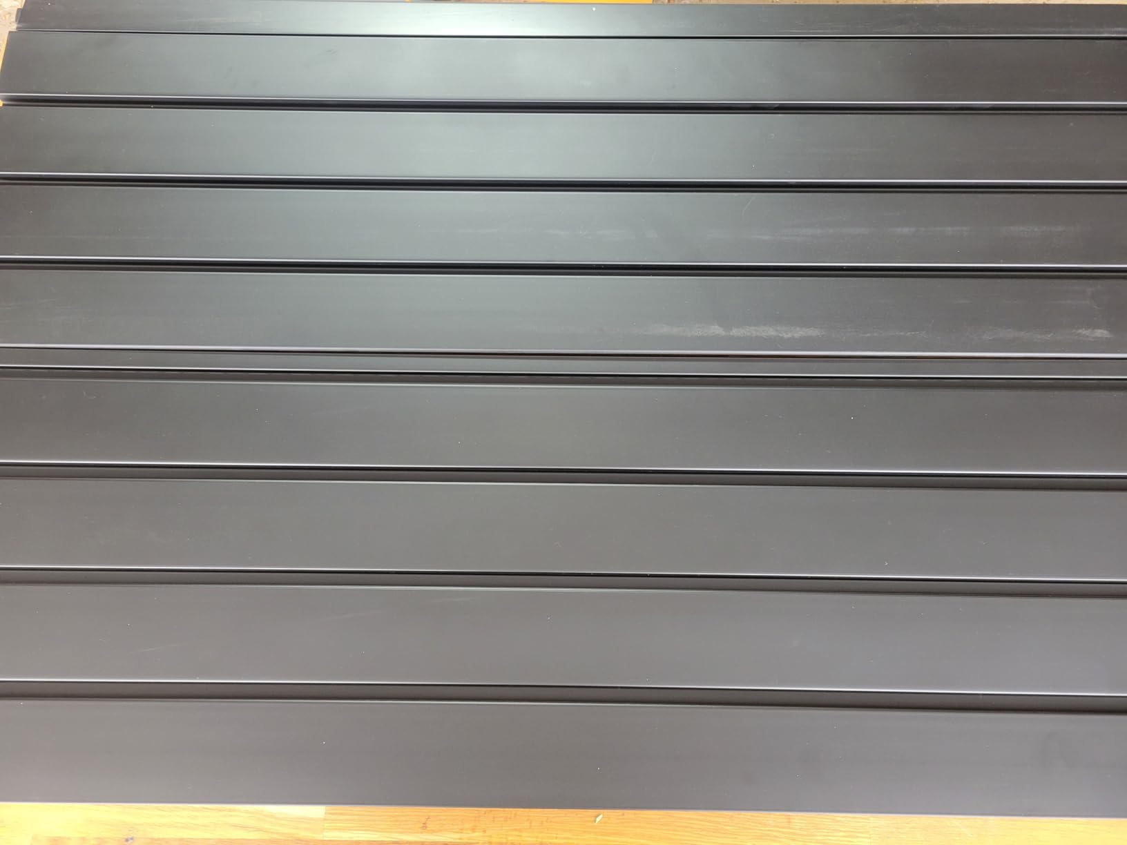 Yuzzy Slat Wall Paneling 4 x 8ft, Garage Slatwall Panel Wall Storage Systems, Heavy Duty PVC Garage Wall Organization (Black) customer photo 1